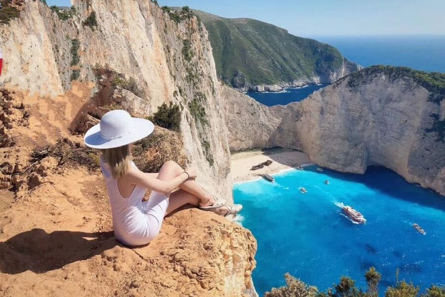 Zakynthos Small Group Tour Shipwreck & Blue Caves Land & Sea - Swimming inside the Blue Caves
